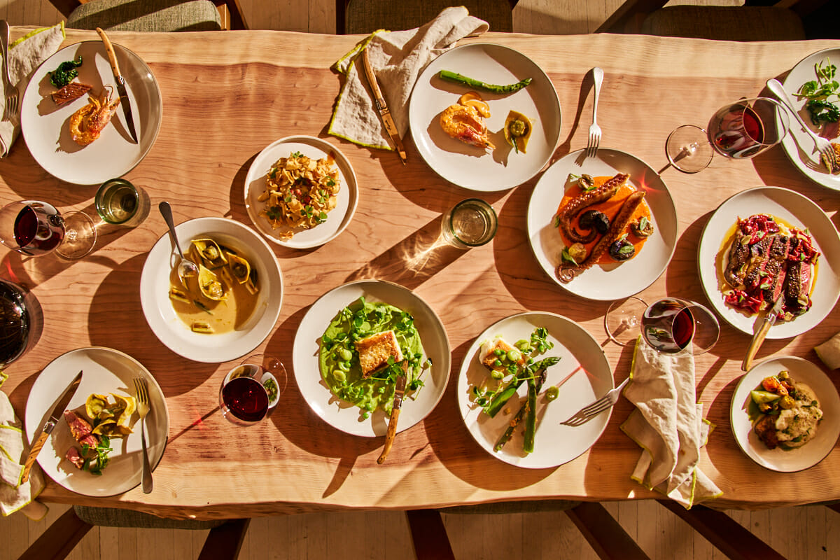 A rustic table of dishes from The Lodge